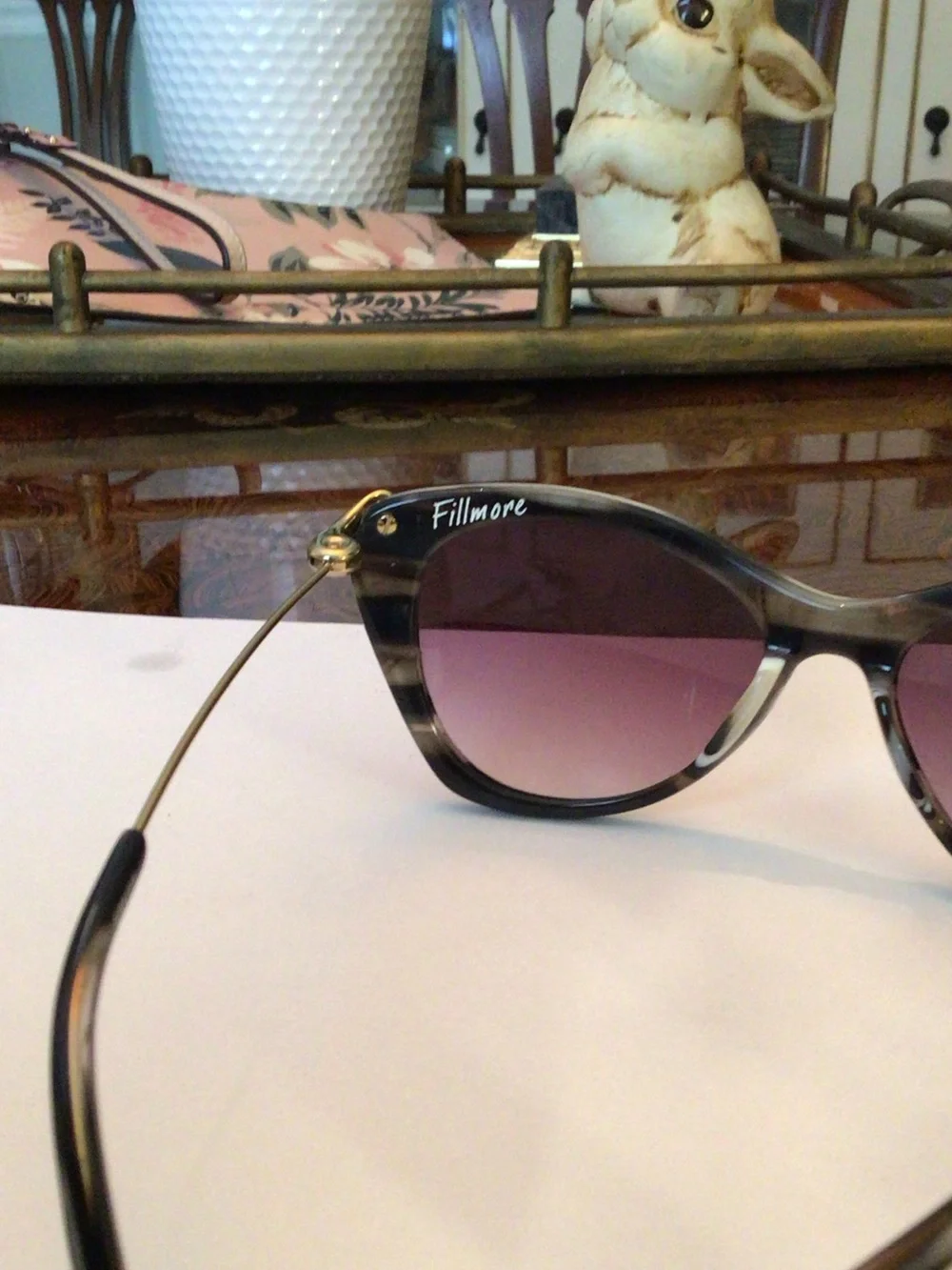 Elizabeth and James Black & White Striped Cat-Eye Sunglasses with Purple Lenses